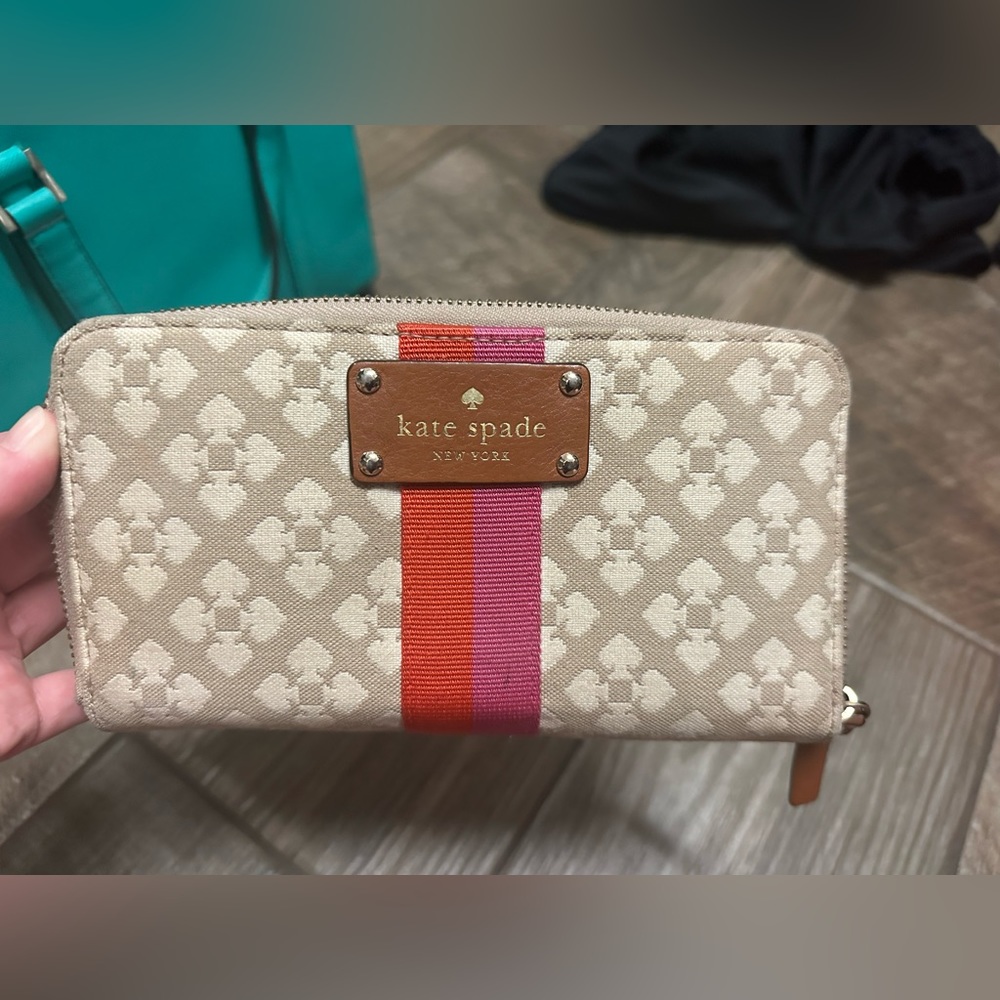 Kate spade wallet . Has light staining